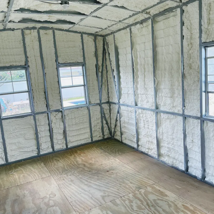 Closed-cell spray foam insulation applied to wall cavities in a residential project in North Castle